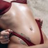 Obrácený piercing do pupíku s kytičkami, tyrkysové zirkony