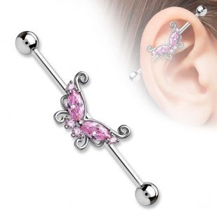 Industrial piercing s růžovým motýlem