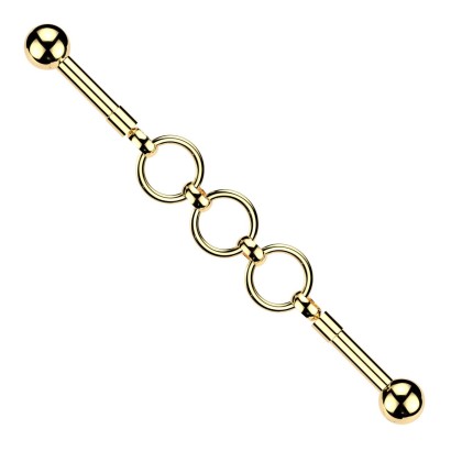 Zlacený industrial piercing s kroužky