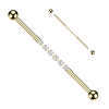 Zlacený industrial piercing se zirkony