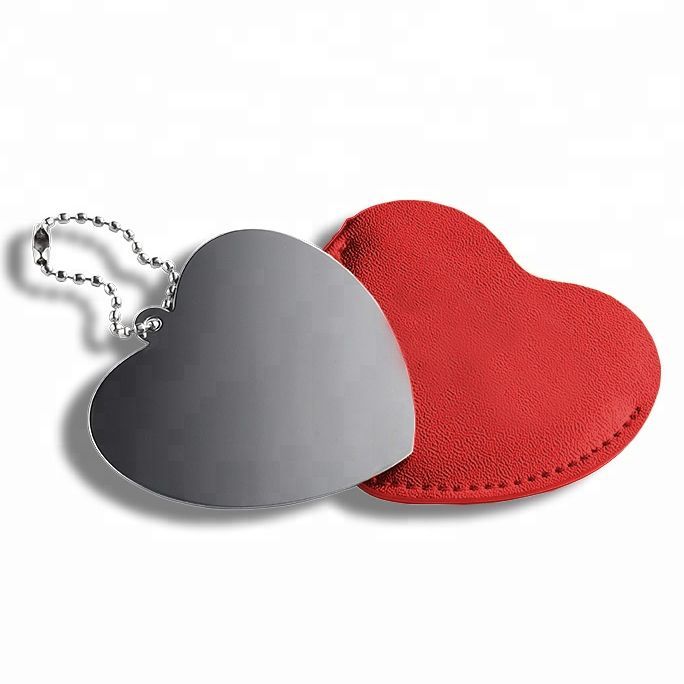 S4U Ocelové kapesní zrcátko srdíčko, červené pouzdro - KZ013